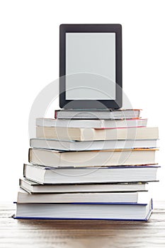 Picture of empty black picture frame on stack of books