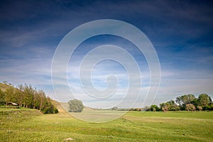 Panorama of Titelski breg, or titel hill, in Vojvodina, Serbia, with a countryside grassfield, in an agricultural landscape with photo