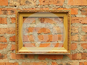 Picture frame from baguette on the background of an old brick wall