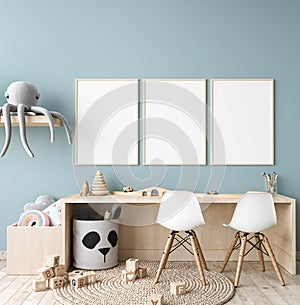 Picture frame mock up in nursery interior, wooden desk on blue wall background