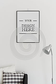 Picture frame mockup hanging on a wall