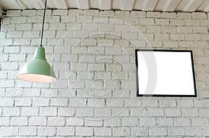 Picture frame in room with ceiling lamp