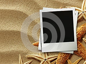 Picture frame on shells and sand background photo