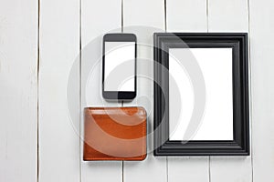Picture frame and smartphone and brown Wallet