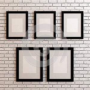 Picture frames on white wall