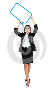 Picture of full lenght business woman holding blank text bubble photo