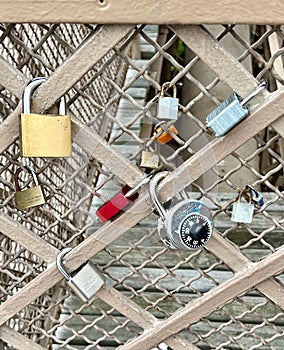 Picture of a gate with padlocks on the Brooklyn Bridge