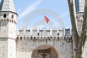 ISTANBUL, TURKEY - MAY 22, 2022: Entrance to Topkapi Palace from the Gate of Salutation, also known as Middle Gate or orta Kapi. photo