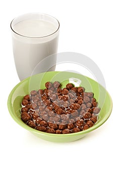 Picture of glass of milk and plate of chocolate flocks