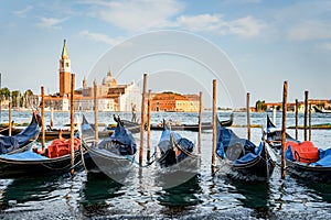 Picture with gondolas moored on Grand Canal near Saint Mark square, in Venice Italy