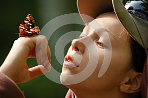 Picture of a happy girl with a butterfly