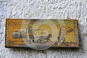 Picture of hunting on the piece of wood
