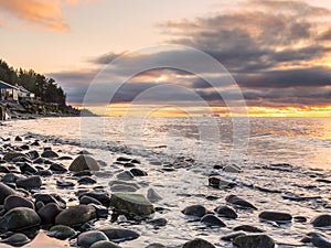 Picture of an idyllic view of the seashore at sunset photo