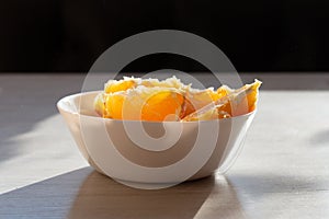 Picture of juicy fresh orange wedges in a bowl