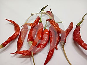 Picture of kashmiri chilli mirch in isolated white background
