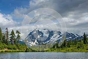 Picture Lake is the centerpiece of a strikingly beautiful landscape in the Heather Meadows area of Mt. Baker, WA.