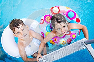 Picture of little kids enjoying in swimming pool