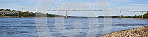 A picture of a long bridge reaching across Mississippi river