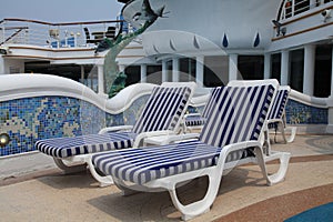 A picture of the lounge chairs onboard the ship.