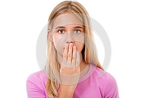 Picture of lovely young girl with hand over mouth.Isolated