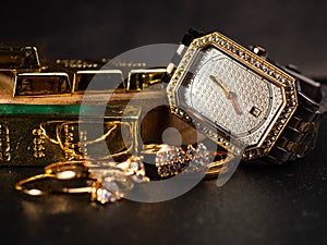 Picture of luxury woman wrist watch. Thus watch on a gold color and silver dial