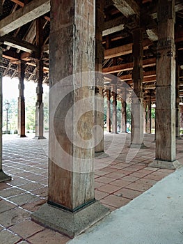 Wooden pillar\'s at the temple of the holy tooth relic in Sri Lanka photo