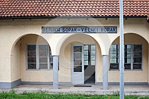 entrance to the train station of Veliki Borak, with the name of the village Veliki borak written in latin and cyrillic alphabet. photo