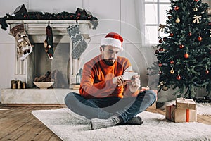 Portrait of attractive man before christmas photo