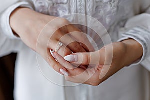 Picture of man and woman with wedding ring.Young married couple holding hands, ceremony wedding day. Newly wed