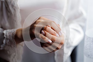 Picture of man and woman with wedding ring.Young married couple holding hands, ceremony wedding day. Newly wed