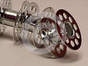 Picture of metal bobbins, used for winding thread