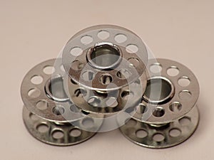 Picture of metal bobbins, used for winding thread