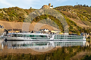 Picture of the Mosel in Bernkastel-Kues with cruise ship at golden hour
