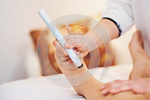 Picture of moxibustion therapy on woman body