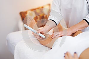 Picture of moxibustion therapy on woman body