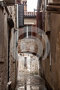 Picture of a narrow medieval street of the historical center of Piran Slovenia.