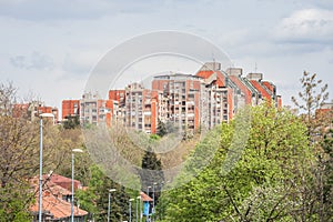 Brutalist socialist Yugoslav high rise apartment buildings, housing towers, in the residential district of Banjica photo