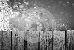 Picture of pale old wooden planks in black and white.