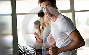 Picture of people running on treadmill in gym