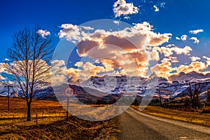 Picture perfect snow capped Drakensberg escarpment mountains and green plains in Underberg near Sani pass South Africa