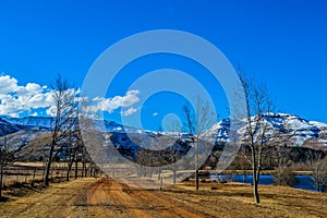 Picture perfect snow capped Drakensberg mountains and green plains in Underberg near Sani pass South Africa