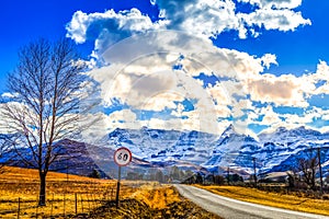 Picture perfect snow capped Drakensberg mountains and green plains in Underberg near Sani pass South Africa