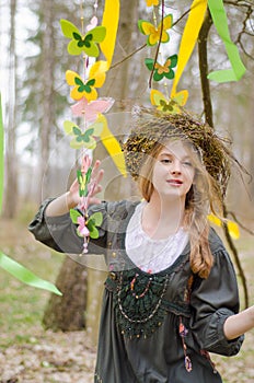 Picture of a pretty girl in a folk circlet of flowers