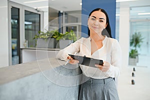 Picture of pretty receptionist at work.