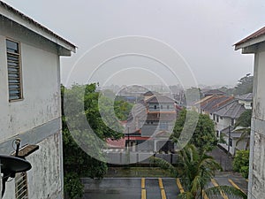 picture during the rain in the area of the housing estate in Johor Jaya