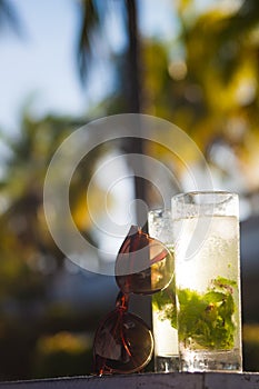 Picture or refreshening mojito cocktail and sunglasses. Cuba, Cayo Largo. Caribbean