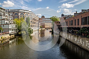 Picture from the river elster in the scene district leipzig schleussig with beautiful lofts in old industrie buildings