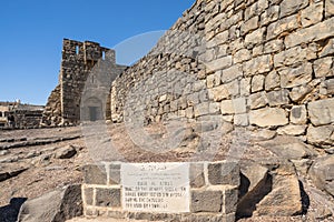 Ruins of Qasr al-Azraq, fort located in the desert of eastern Jordan photo