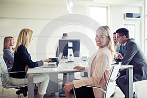 Picture of sales agents working together in office