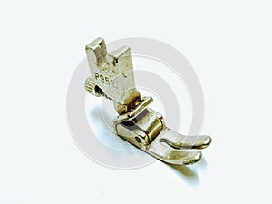 A picture of sewing machine part on a white background   ,